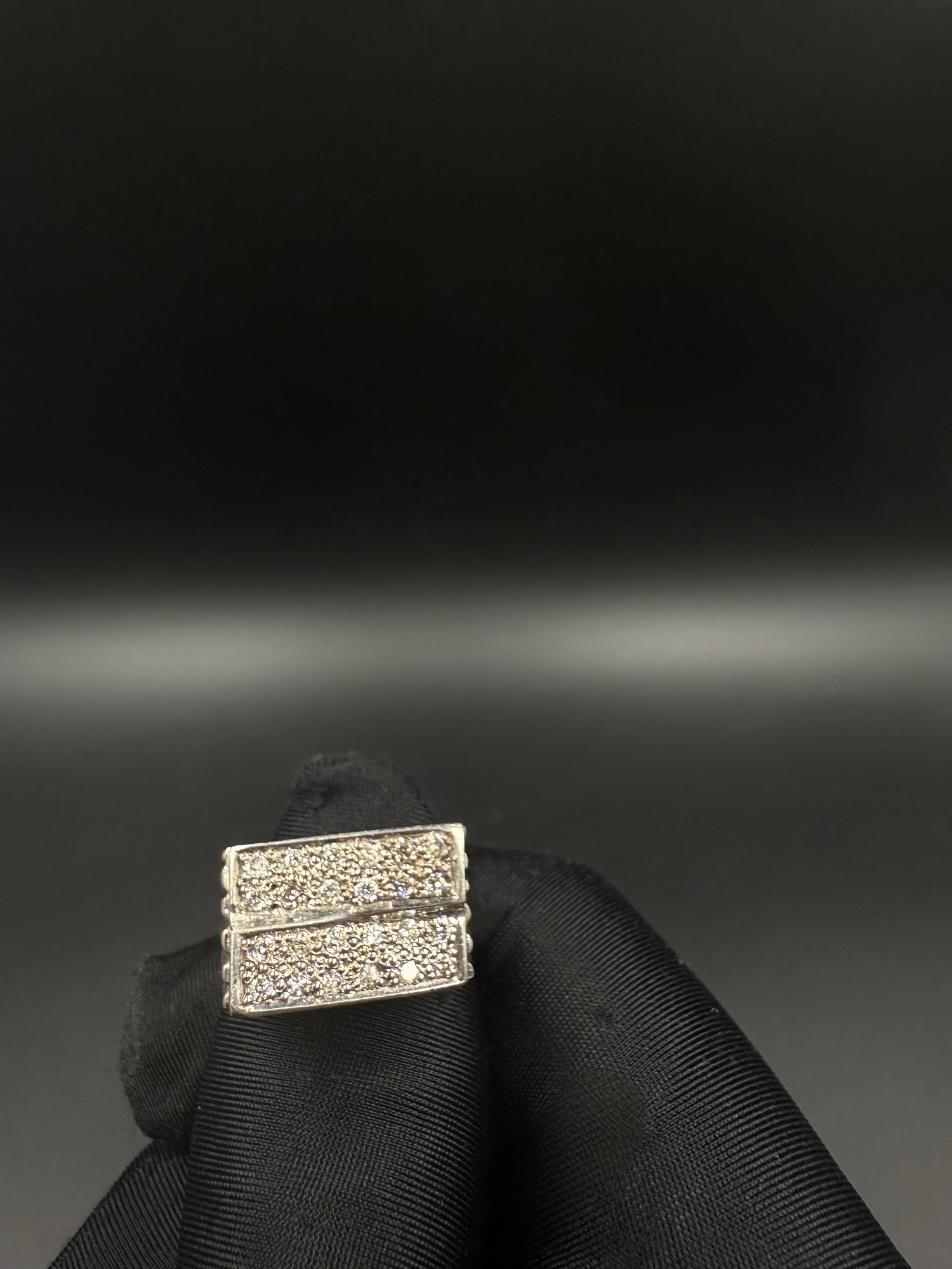 Silver and diamond ring